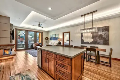 a kitchen with a island in the middle of a room at Luxury Three Bedroom Residence steps from Heavenly Village condo in South Lake Tahoe