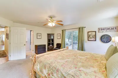 a bedroom with a bed and a ceiling fan at Gateway to Yosemite Group-Friendly Groveland Home in Groveland