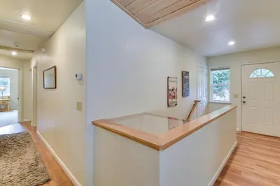 a kitchen with white walls and a wooden counter top at Gateway to Yosemite Group-Friendly Groveland Home in Groveland