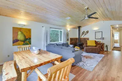 a living room with a couch and a table at Gateway to Yosemite Group-Friendly Groveland Home in Groveland