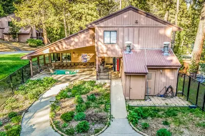 an aerial view of a house with a pool at Lake Therapy in Lakeshore