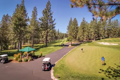 an aerial view of a golf course with people playing golf at Truckee Treat in Truckee