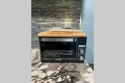 a toaster oven sitting on top of a counter at Comfy, Quiet, Condo near Lake Mary and the Village in Mammoth Lakes