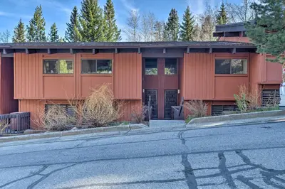 a house on the side of a road at Contemporary Mountain Retreat - Walk to Slopes! in Mammoth Lakes