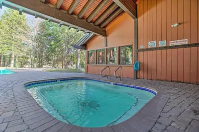 a swimming pool in the middle of a house at Contemporary Mountain Retreat - Walk to Slopes! in Mammoth Lakes