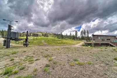 a dirt road in the middle of a field at Half-Mi to Trails Rustic Soda Springs Cabin! in Soda Springs