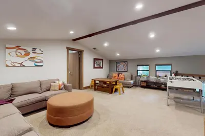 a living room with a couch and a table at Hammock Holidays in Truckee