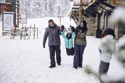 a group of people standing in the snow at Beautiful 4-Bedroom Contemporary Mountain Home condo in Truckee