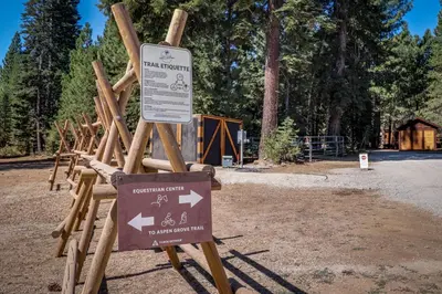 a sign in front of a park with trees at Blue Antler in Truckee