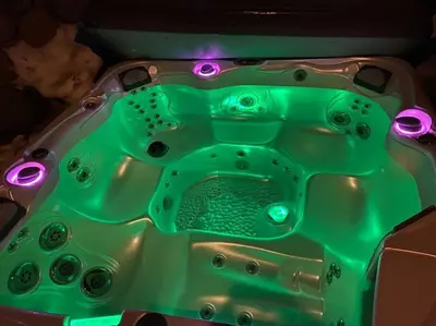 a green tub with lights on top of it at Tahoe Donner Luxury, Sleeps 14, Hot tub, 3100 sqft in Truckee
