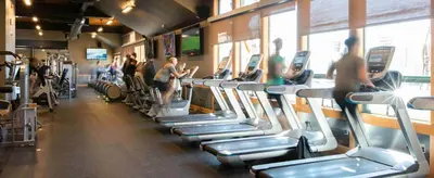 a gym with people exercising on tread machines at Tahoe Donner Luxury, Sleeps 14, Hot tub, 3100 sqft in Truckee