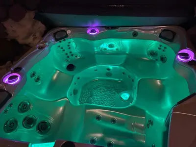 a green bath tub with lights on it at Tahoe Donner Luxury, Sleeps 14, Hot tub, 3100 sqft in Truckee