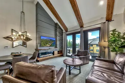 a living room with a couch and a table at Luxury Two Bedroom Residence steps from Heavenly Village condo in South Lake Tahoe