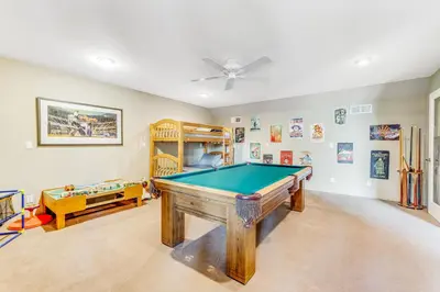 a room with a pool table in it at Harvest Moon Hideaway in Groveland