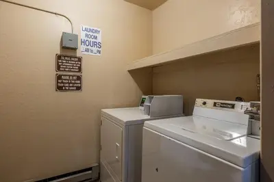 a laundry room with a washer and dryer at Mammoth Ski Racquet Club 32 - Newly Remodeled Pet Friendly in Mammoth Lakes