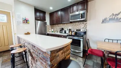 a kitchen with a brick counter top in a room at San Sierra #26 condo in Mammoth Lakes