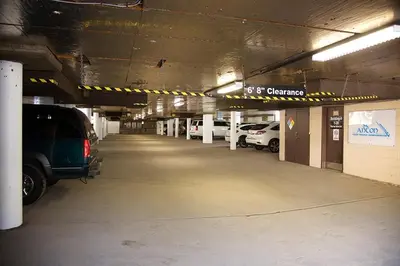 a parking lot with cars parked in a parking garage at St Anton Wooded View 2-Bedroom Condos with Ski Lockers in Mammoth Lakes