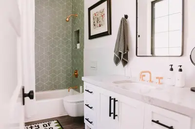 a bathroom with a sink and a toilet and a mirror at Sacramento Guest House with Patio about 5 Mi to Downtown in Sacramento
