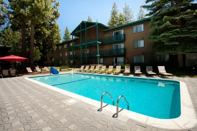a swimming pool in front of a hotel at Forest Suites Resort at the Heavenly Village in South Lake Tahoe