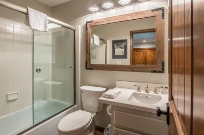 a bathroom with a toilet and a sink and a shower at Helios 9N in Mammoth Lakes