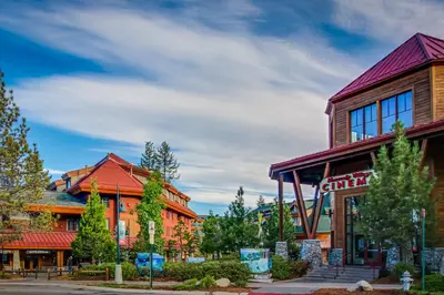 a group of buildings on a street at The Lazy Golden Cabin in South Lake Tahoe