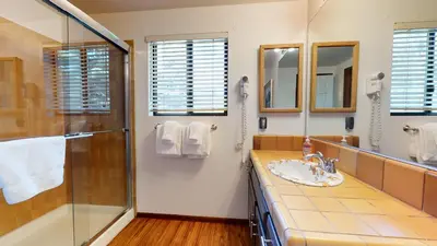 a bathroom with a sink and a shower at Snowflower #20 condo in Mammoth Lakes