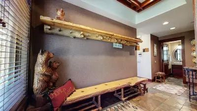a room with two statues of animals on the wall at Juniper Crest #24 townhouse in Mammoth Lakes