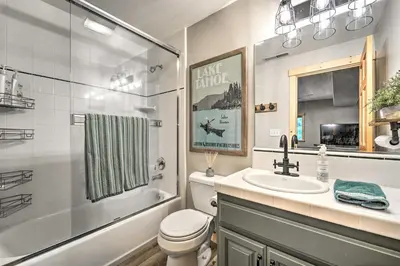 a bathroom with a sink and a toilet and a shower at Bikes, Grill and Views Luxe Truckee Cabin! in Truckee