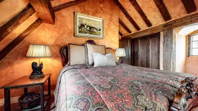 a bedroom with a bed and a wooden ceiling at Juniper Ridge #16 home in Mammoth Lakes