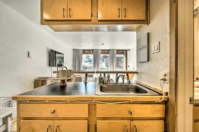 a kitchen with a sink and a counter at Walk to Ski Resort Tahoe Donner Studio with Balcony in Truckee