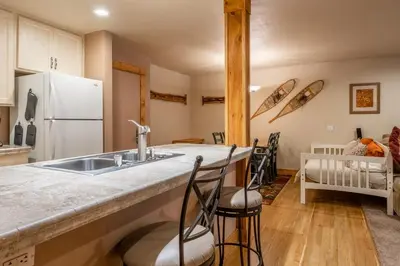 a kitchen with a sink and a counter top at New Listing Updated 1 bedrm 1 bath Summit H Building #95 condo Just steps to Eagle Lodge sleeps 4 in Mammoth Lakes