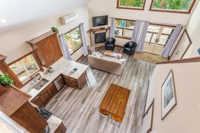 an overhead view of a living room with wooden floors at Devonshire - Aragon in Yosemite West