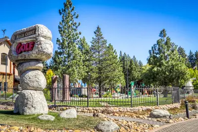 a rock statue in front of a playground at Tahoe's Stunner in Tahoe Vista