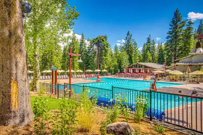 a pool at a resort with people playing in it at Truckee Treat in Kingswood Estates