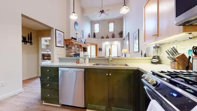 a kitchen with a sink and a stove at Mammoth Green #214 condo in Mammoth Lakes