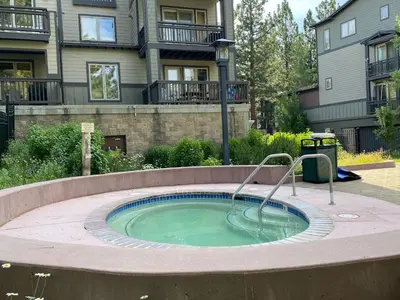 a small pool of water in a yard at Mammoth Green #214 condo in Mammoth Lakes