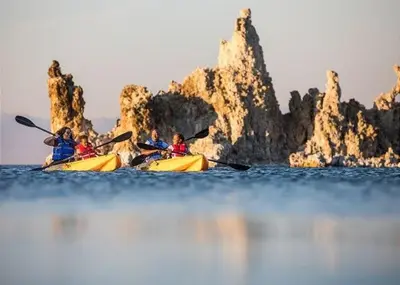 a group of people in kayaks in the water at Two-Bedroom Apartment in Mammoth Lakes