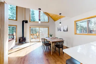 a kitchen and dining room with a table and chairs at Truckee Secret in Truckee