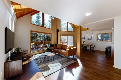 a living room with a couch and a table at Truckee Secret in Truckee
