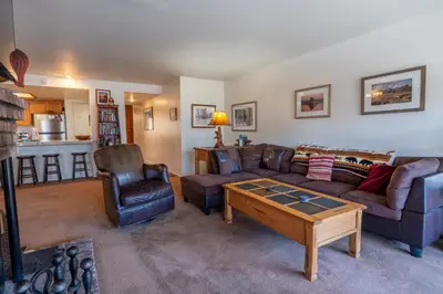 a living room with a couch and a table at Rr-interlaken 19 in June Lake