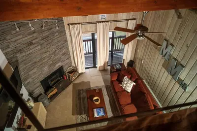 an overhead view of a living room with a ceiling fan at COZY Condo at Canyon Lodge! Sleeps 8, a walk to Canyon Lodge in Mammoth Lakes