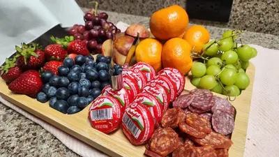 a tray of fruits and nuts on a table at Big Creek Inn in Fish Camp