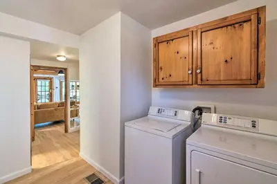 a laundry room with a washer and dryer at Wine Country Escape with Hot Tub in River Pines! in River Pines