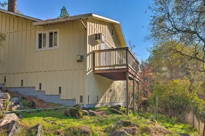a house with a deck on the side of it at Wine Country Escape with Hot Tub in River Pines! in River Pines
