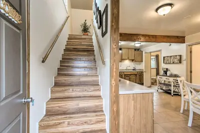 a staircase leading to a kitchen and a living room at Family Home Near Kings and Sequoia National Parks! in Squaw Valley
