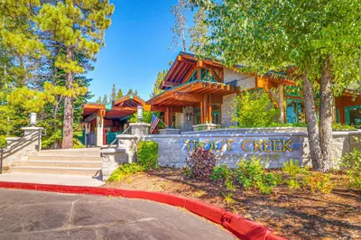 a house with a sign in front of it at Little Pinecone Retreat in Truckee