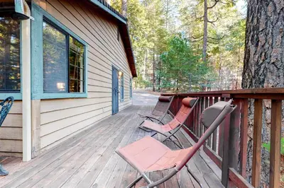 two chairs sitting on the porch of a house at Hikers Haven in Arnold