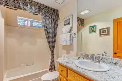 a bathroom with a sink and a shower at Mountainside Retreat in Truckee