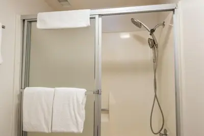 a bathroom with a shower with a glass door at New Listing 2 bedroom and Loft 2 bath Summit E Bldg 16 condo sleeps 8 Steps to Eagle Lodge Chair 15 in Mammoth Lakes