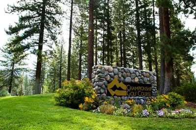 a sign for a campoperative golf course in a park at Peace Among the Pines in Incline Village